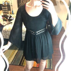 4/$25 Black midi dress with flare asymmetrical sleeves & floral crochet waist